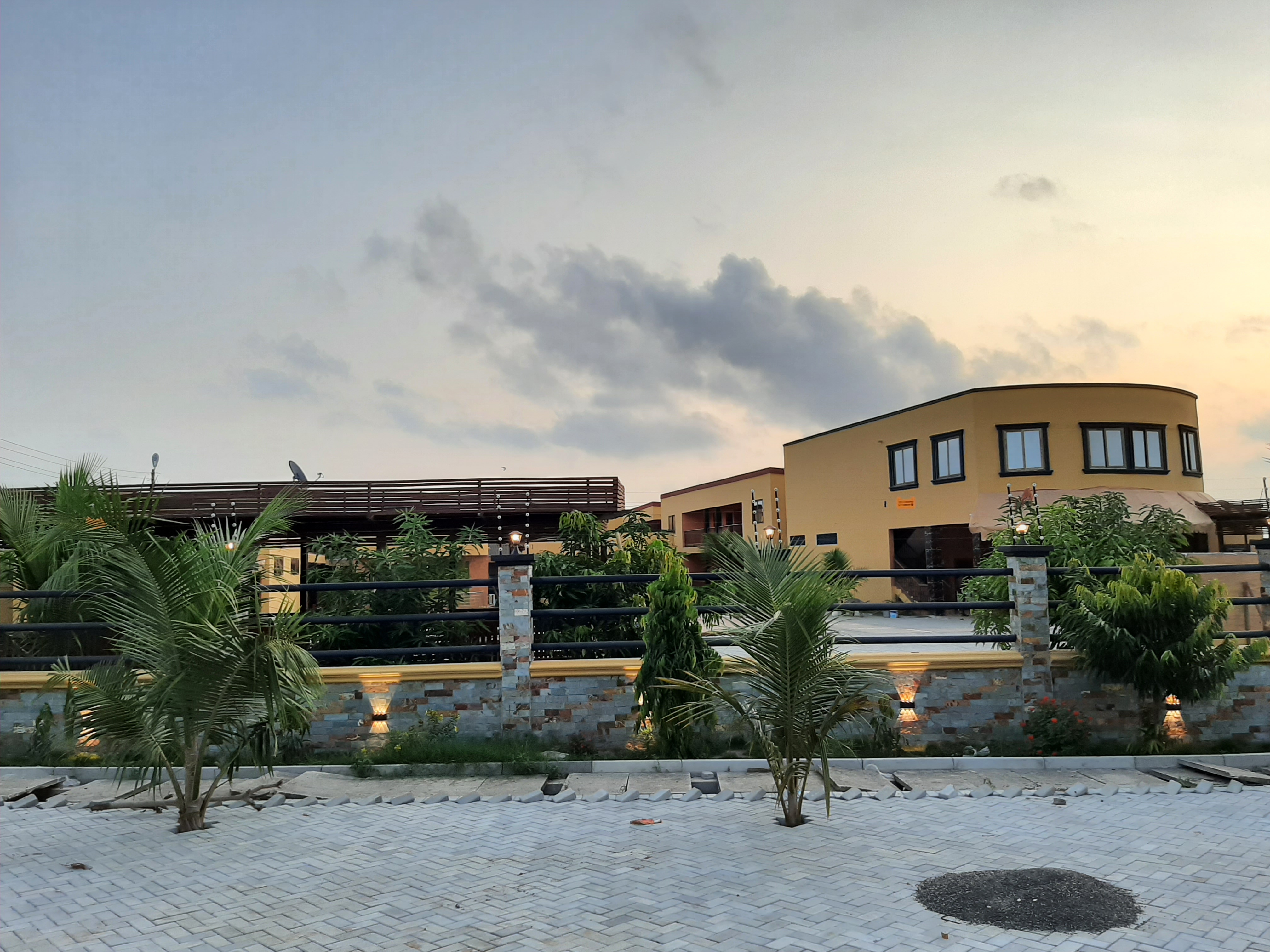 Madui Palce Hotel exterior at dusk